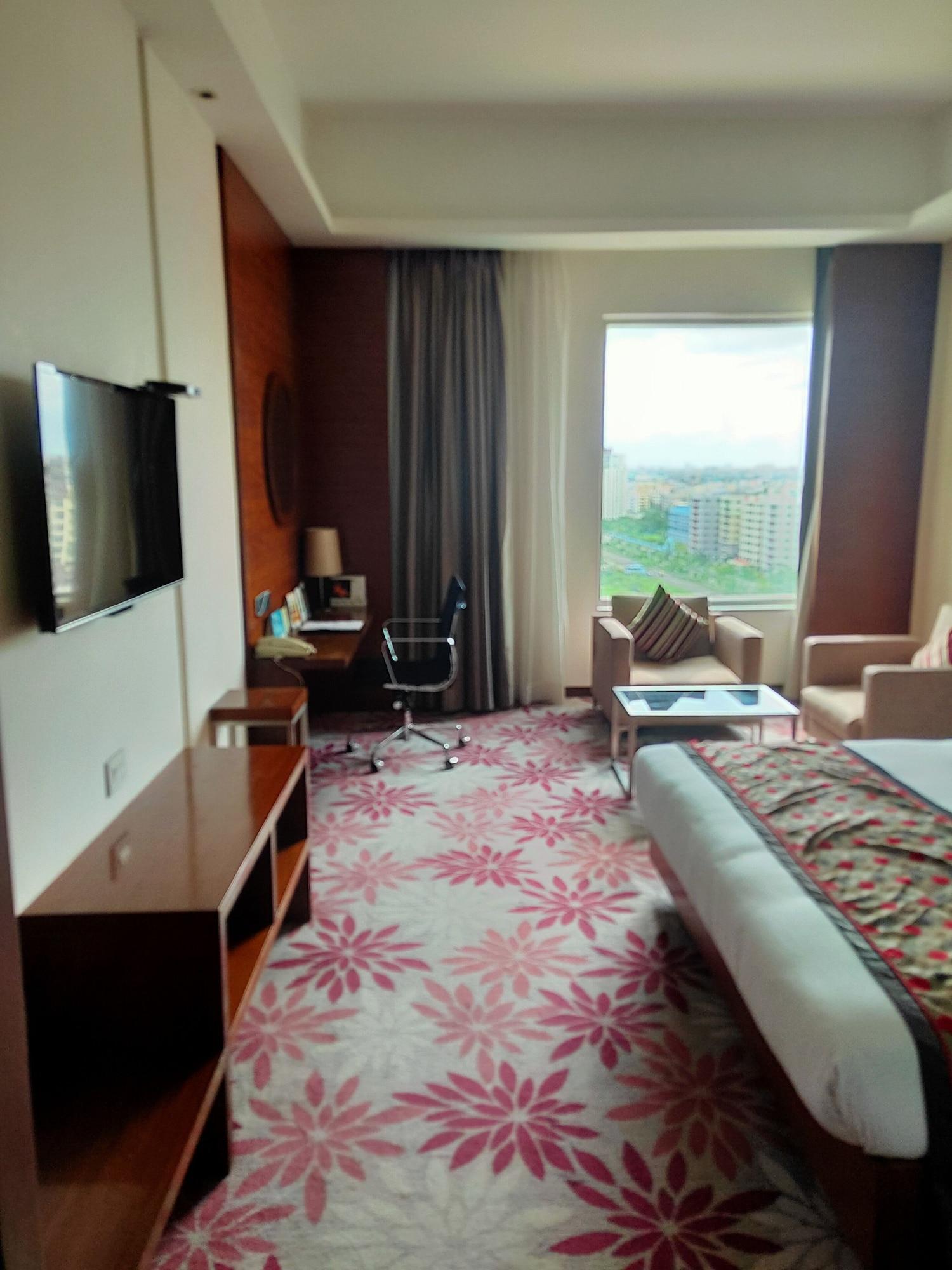 Pride Plaza Hotel, Kalkutta Exterior foto A room at the hotel