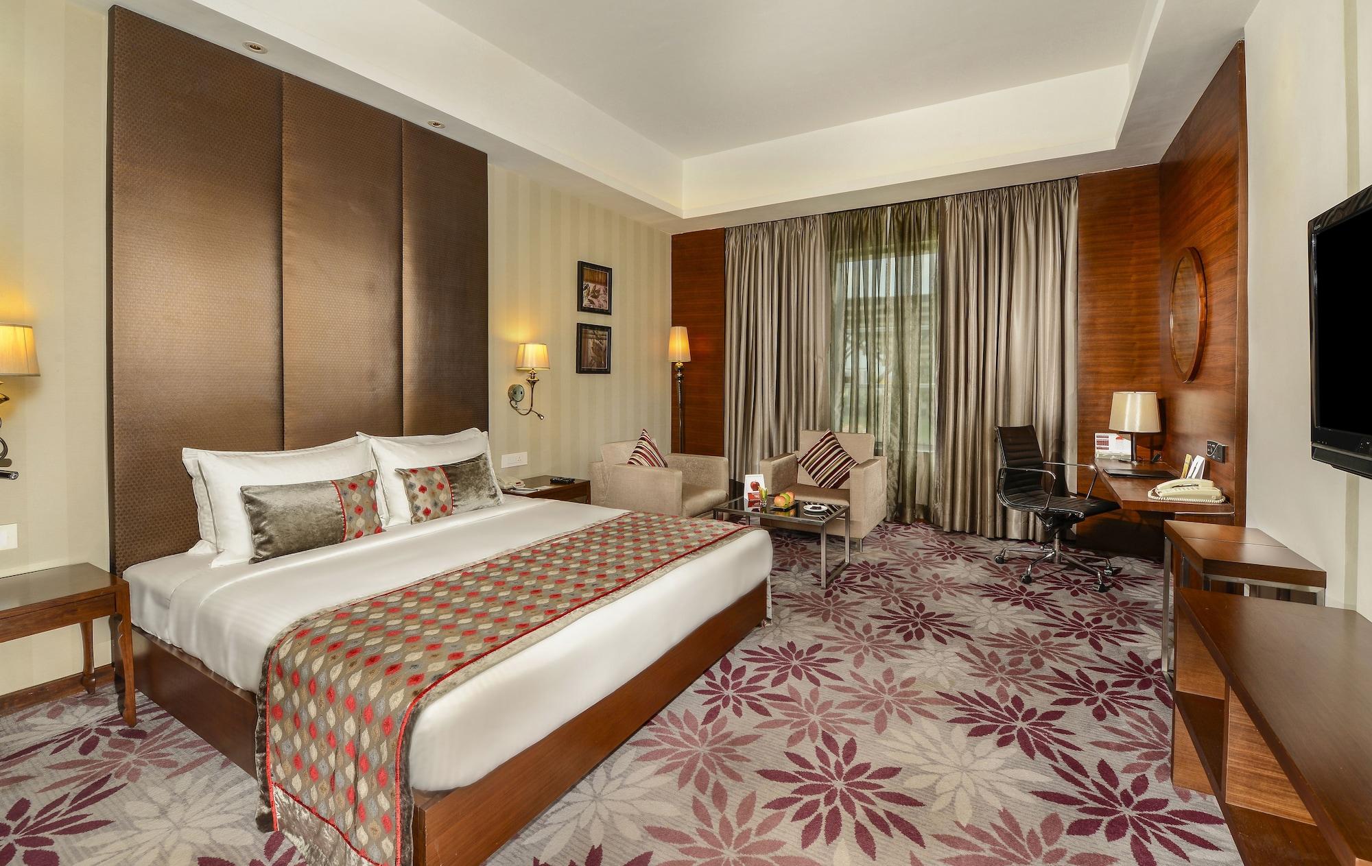 Pride Plaza Hotel, Kalkutta Exterior foto A room at the Taj Bengal