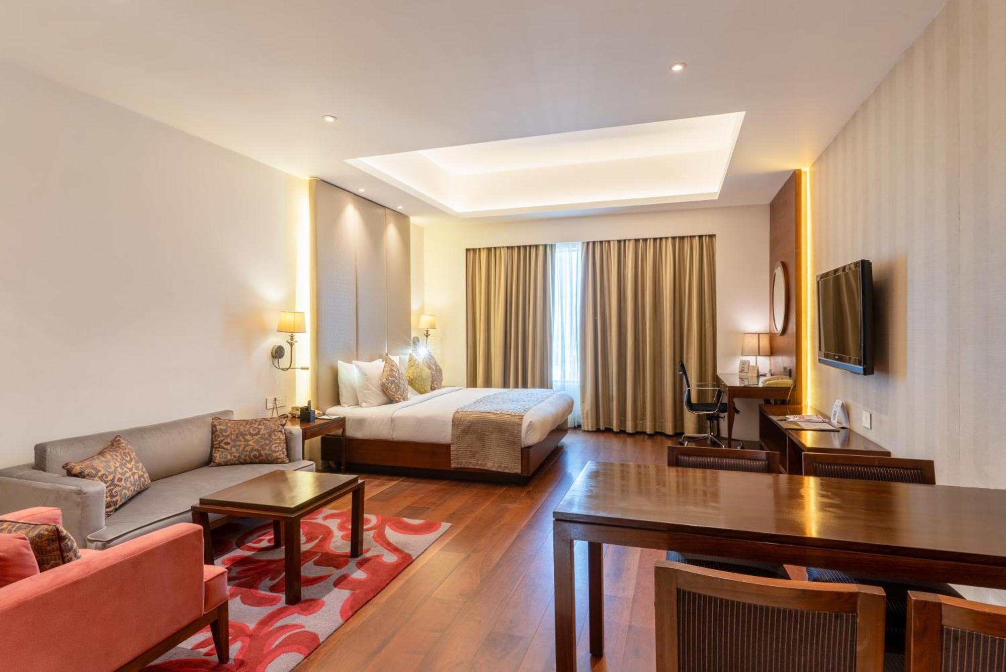 Pride Plaza Hotel, Kalkutta Exterior foto A room at the hotel