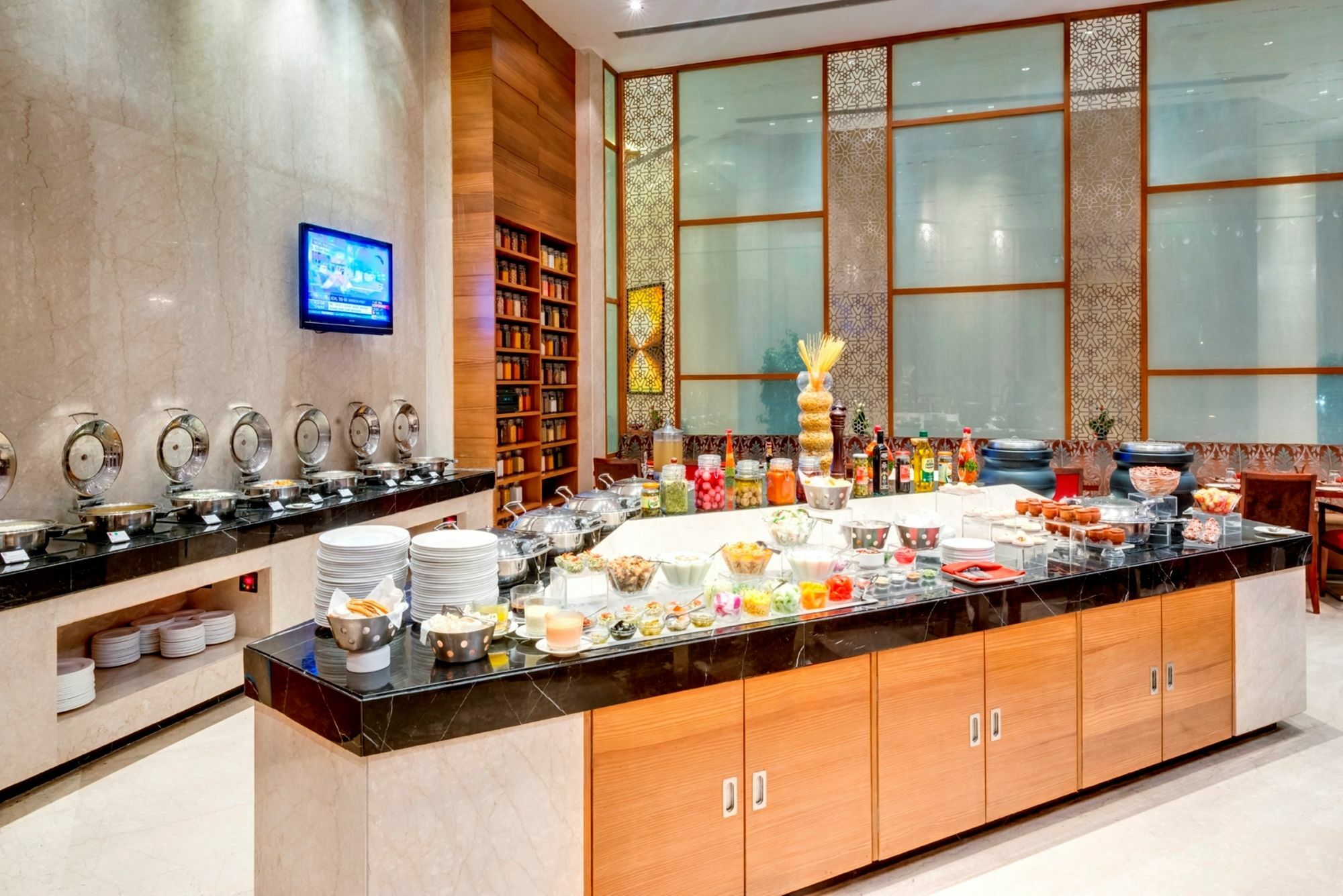 Pride Plaza Hotel, Kalkutta Exterior foto A buffet at a hotel